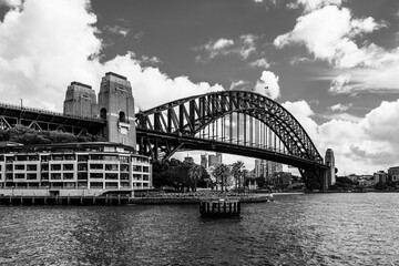 Fototapeta premium Sydney, New South Wales, Australia: Sydney Harbour Bridge, famous iconic travel landmark in black and white