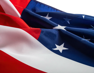 Close-up view of the draped national flag with red, white stripes and starry blue field