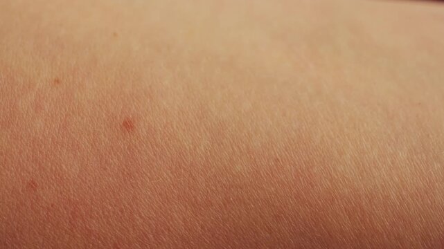 Texture of human skin. Close up footage of arm. Concept of hygiene and medical. High quality 4k footage