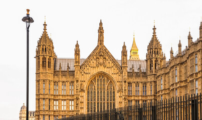 Palace of Westminster, home of the Houses of Parliament, showcasing historic Gothic architecture,...