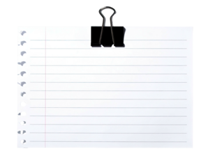 A white lined paper sheet held by a black binder clip, against a black backdrop