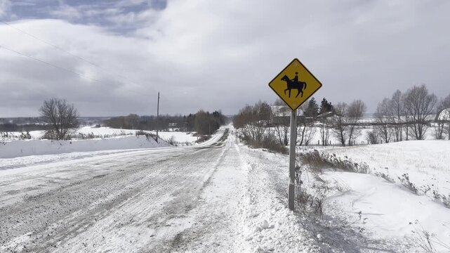 Country road swept by a snow blizzard - Route de campagne balay&eacute;e par un blizzard de neige