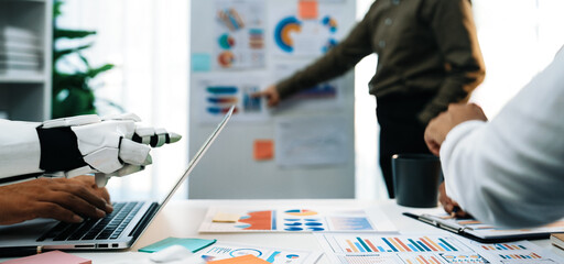 A modern office scene showcasing a robotic arm engaged in a business meeting, analyzing data and...
