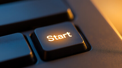 Close up of a glowing start button on a modern keyboard, illuminated with bright orange light, ready to begin a new project or game. Symbolizing initiation and progress.