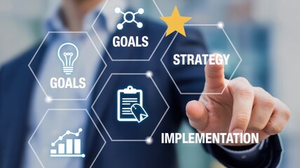 Businessman touching strategy icon in futuristic interface with goals and implementation hexagons in blue digital lighting for corporate presentation