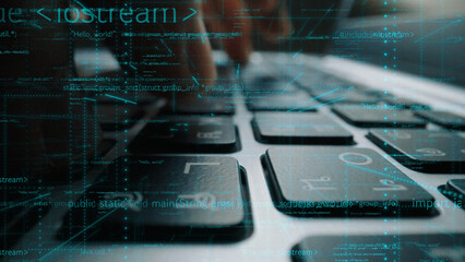 Focused shot of hands actively typing on a computer keyboard, blending the elements of technology and digital coding to emphasize modern communication and innovation. Xenic