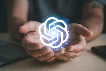 Human hands gently cradling the glowing openai chatgpt logo, symbolizing the future of ai