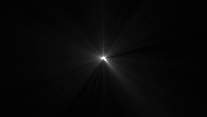 Obraz premium Bright light on black background with radiating beams