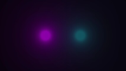 Purple and teal glowing orbs on dark background
