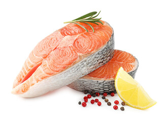 Pieces of salmon fillet with spices and lemon isolated on white