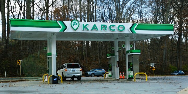 Kenneth Square, Pennsylvania, U.S - Dec 6, 2025 - The Eco-themed KARCO gas station with clover logo and fuel pumps