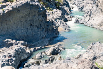 Alcantara Gorges, a lava canyon formed by the Alcantara River with its basalt walls during a sunny day