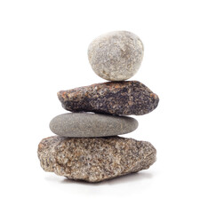 Stack of balancing zen stones isolated on white background.