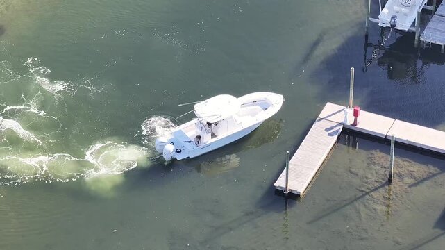 Above sportfishing boat docking
