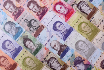 Obraz premium Venezuelan bolivar, cash, currency of Venezuela, banknotes for transactions. Venezuelan bolivar