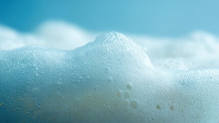 Fototapeta premium Beer foam macro with node grid and coin accent in soft blue haze