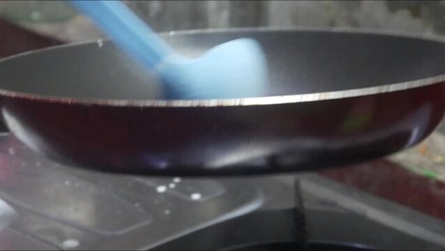 the process of making risol skin food in a Teflon pan made from wheat flour dough