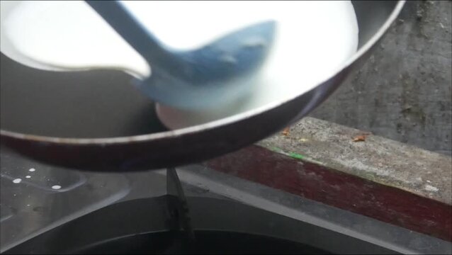 the process of making risol skin food in a Teflon pan made from wheat flour dough