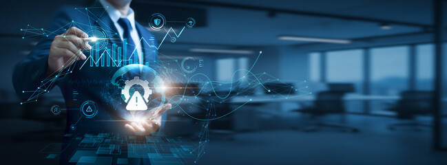 Businessman hand hold global risk management network and data, threat assessment strategy, enterprise protection planning, financial and operational control