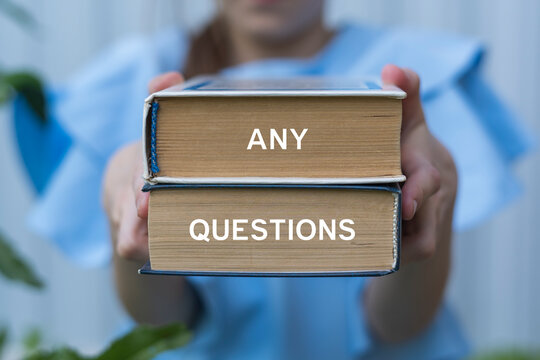 Young girl holding two books with inscription on side: ANY QUESTIONS. Any Question Answer Education Business concept. Information, FAQ, Guide, Problem Solution.