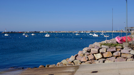 Port and lighthouse of Erquy, a commune in the C&ocirc;tes-d'Armor department of Brittany in northwestern France on the c&ocirc;te de Penthi&egrave;vre.