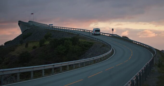 Camper Van on Storseisundet Bridge, Atlantic Ocean Road at Sunset, Norway