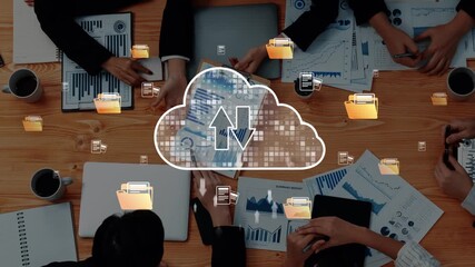 A modern business meeting scene showcasing teamwork and digital cloud storage concepts, emphasizing data analytics and effective collaboration among professionals. Raster - Powered by Adobe