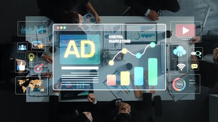 This image depicts a team engaged in a meeting focused on digital marketing, featuring charts and data insights aimed at enhancing business advertising efforts. Raster