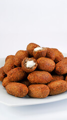 Kibbeh stuffed with cream cheese.
