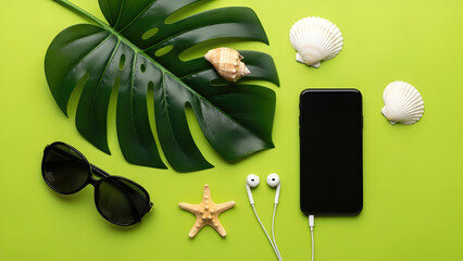 Tropical Summer Flat Lay with Smartphone, Sunglasses, and Monstera Leaf on Green Background