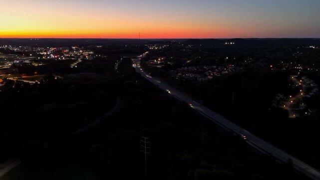 Aerial view of Pennsylvania Turnpike traffic at sunset near Monroeville, PA