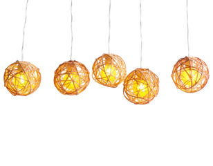 Overhead shot of five glowing spherical lights, suspended by cords against a black background