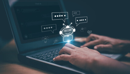 Artificial intelligence concept. Virtual chatbot icon and chat bubbles above laptop. Conversational AI, automated customer support, smart communication, digital assistant and future technology.