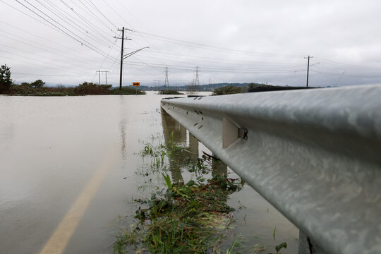Flood water covers a street. Severe flooding and weather with leading lines. 