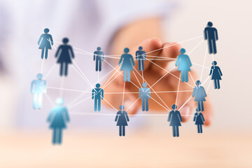 Abstract network of people connecting with hand, representing social media, business, networking, or communication. Human silhouettes connected.