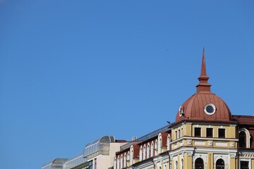 A classic European-style building with a red rooftop in Kyiv.