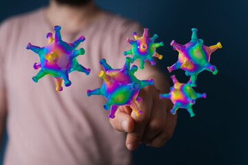 Abstract digitally rendered coronavirus molecules floating with a pointing finger. Concept of infection, medic