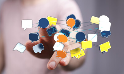 Hand reaching out to connected speech bubbles, concept of communication, social media, connection and digital t