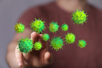 Image depicting a hand interacting with digital virus particles, symbolizing healthcare, medicine,...