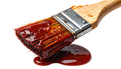 A close-up shot of a paintbrush dripping dark red paint