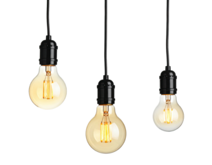 Three modern electric bulbs hanging from black cords against a stark, black background