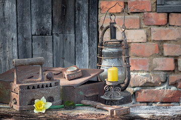 Antique objects and tools.Household items used in the 18th and 19th centuries.A metal box with tools and household items.
