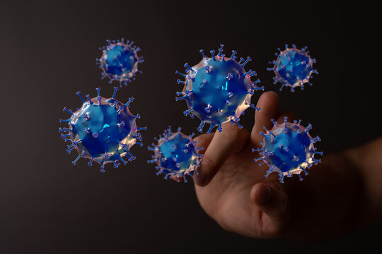 Hand touching digital representation of coronavirus cells on dark background. Abstract illustration representi - Powered by Adobe