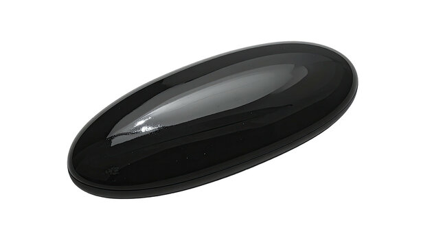A high-angle, isolated shot of an elongated, glossy, black capsule against a stark, black background