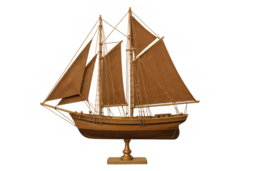 Wooden sailing ship model, a detailed handcrafted schooner replica displaying nautical decor and maritime history