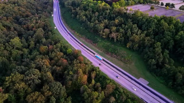 Aerial view of traffic on the Pennsylvania Turnpike at sunset near Monroeville, PA