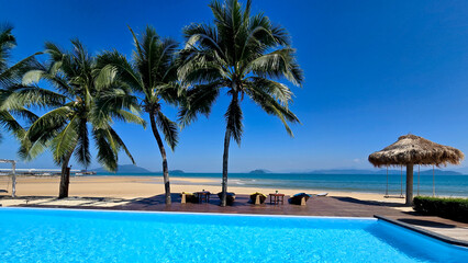 Tropical paradise at Koh Phayam Island with a stunning pool view and palm trees