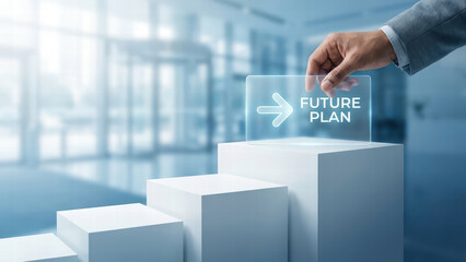 Hand placing transparent sign with Future Plan on ascending white blocks, symbolizing growth and strategic planning in modern office environment