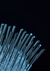 Sterile medical equipment detail showing a cluster of sharp, shiny hypodermic injection needles ready for pharmaceutical use, laboratory, healthcare, drug delivery