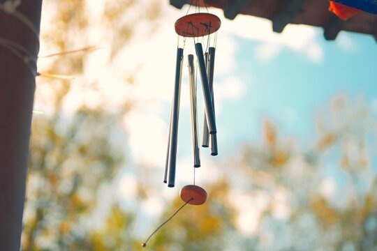 Wind chimes hanging under the eaves